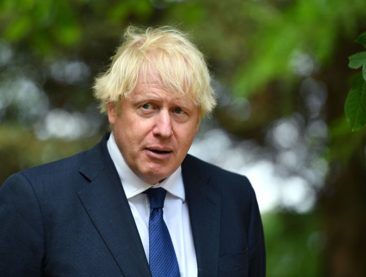 Boris Johnson attends a national service of remembrance at the National Memorial Arboretum in Alrewas, central England on August 15, 2020.