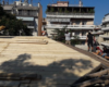 Roof of Libertatia Squat Athens subjected to a Police Raid in August 2020-696x392