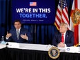 Ron DeSantis and President Donald Trump sitting at a table with a screen that reads "We're In This Together." behind them