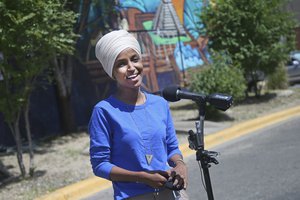 File - Democrat Rep. Ilhan Omar addresses media after lunch at the Mercado Central in Minneapolis Tuesday, Aug. 11, 2020, primary Election Day in Minnesota.