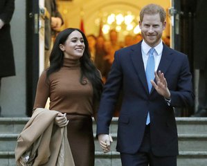 In this Jan. 7, 2020, file photo, Britain's Prince Harry and Meghan, Duchess of Sussex leave after visiting Canada House in London.