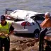 A car landed on Bar Beach in Newcastle on Thursday after driving over the edge of a cliff.