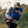 A migrant family walks along the coast  in Deal, England, on September 15. More than 6100 migrants have made the Channel crossing by boat this year according to an analysis by the Press Association. 