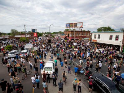 A huge crowd of protesters gathers at the corner of 38th street and Chicago avenue in Minneapolis