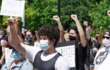 a group of black lives matter protesters, black people at the front