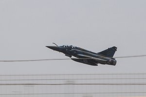 A French air force Mirage 2000 with Fighter Squadron 03/011 Corsica takes off from French Airbase 188 during an air-to-air and air-to-ground combat exercise with AV-8B Harrier jets assigned to Marine Medium Tiltrotor Squadron (VMM) 263 (Reinforced), 22nd Marine Expeditionary Unit (MEU)