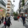 Pedestrians walking pass shops on Drottninggatan in Stockholm, Sweden, on Monday.