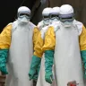 Health workers dressed in protective gear begin their shift at an Ebola treatment centre in Beni in the Democratic Republic of Congo.