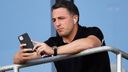 Sam Burgess watches the Rabbitohs play the Cowboys in 2020