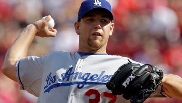 Los Angeles Dodgers pitcher Charlie Haeger (37) pitches against the Cincinnati Reds in the first inning of a baseball game, Saturday, Aug. 29, 2009, in Cincinnati. (AP Photo/Al Behrman)