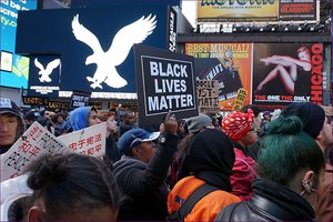 File - Black Lives Matter demonstration on Black Friday. (NYC action in solidarity with Ferguson. Mo, encouraging a boycott of Black Friday Consumerism)