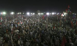 Supporters of the Pakistan Democratic Movement take part in an anti government rally in Karachi, Pakistan, Sunday, Oct. 18, 2020