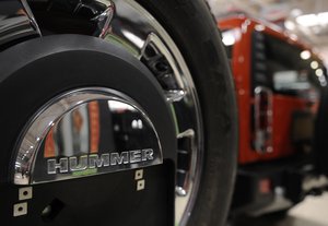 Hummer car models are displayed for sale at a car market in Beijing, China