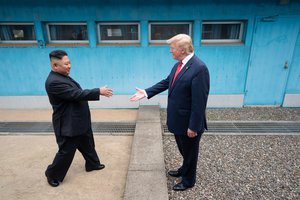 File - President Donald J. Trump shakes hands with Chairman of the Workers’ Party of Korea Kim Jong Un Sunday, June 30, 2019, as the two leaders meet at the Korean Demilitarized Zone.