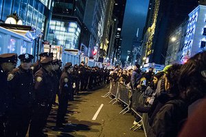 A police line stands in front of an Anti-Trump demonstration outside Trump Tower, New York, November 9, 2016.