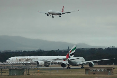 A Qanats jet prepares to land at Melbourne Airport.