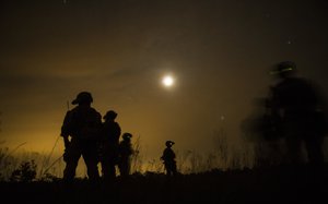 US Army Soldiers prepare to leave the drop zone during fast rope insertion and extraction training