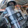 China launches Hong Kong hotline to report law breakers