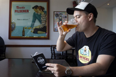 Resch's Appreciation Society co-founder Matt Hendricks at the Forest Lodge Hotel, with one of Reschers passports, Forest Lodge, Sydney, on 4 November 2020. Photo : Jessica Hromas