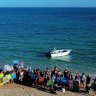 Exmouth locals rally against Gascoyne Gateway's proposal at Qualing Beach. 