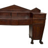 A Regency mahogany "plum pudding" sideboard, circa 1820, sold for $1200.