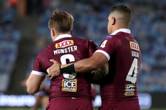 Dane Gagai helps Cameron Munster after his game two concussion.