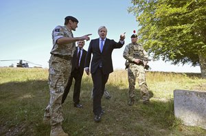 Prime Minister Boris Johnson and Defence Secretary Ben Wallace meet with military personnel