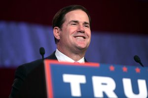 Governor Doug Ducey speaking with supporters of Donald Trump at a campaign rally with Governor Mike Pence at the Mesa Convention Center in Mesa, Arizona