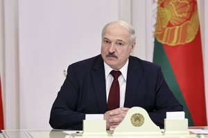 FILE  In this file photo taken on Tuesday, Oct.  27, 2020, Belarusian President Alexander Lukashenko attends a meeting in Minsk, Belarus.