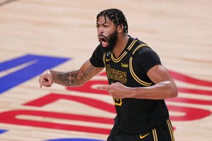 Los Angeles Lakers forward Anthony Davis celebrated during the second half in Game 5 of basketball's NBA Finals against the Miami Heat Friday, Oct. 9, 2020, in Lake Buena Vista