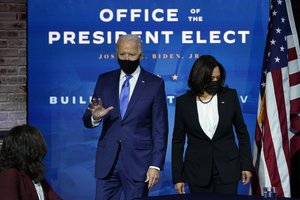 President-elect Joe Biden and Vice President-elect Kamala Harris arrive at an event to introduce their nominees and appointees to economic policy posts at The Queen theater, Tuesday, Dec. 1, 2020, in Wilmington, Del.