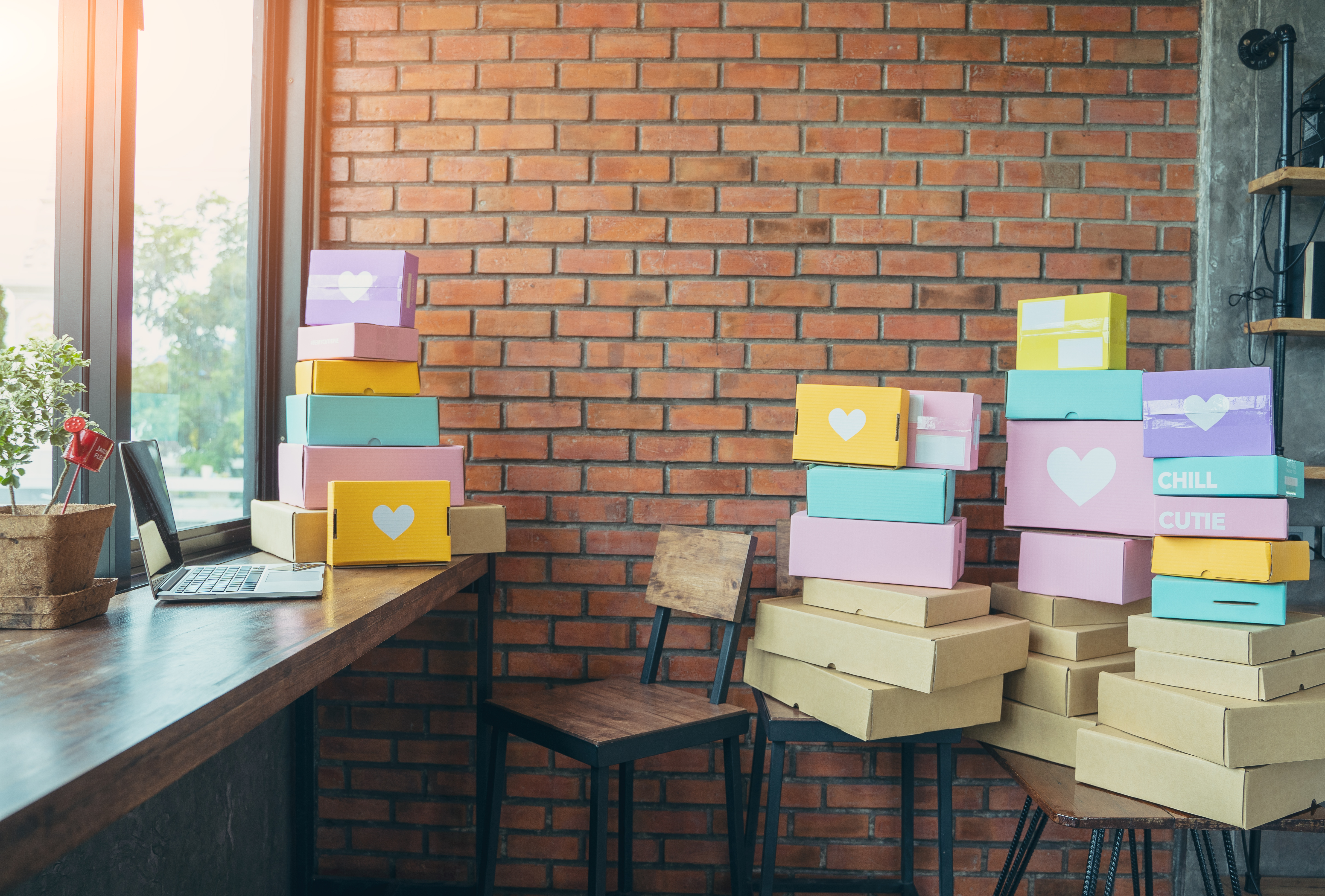 E-commerce boxes on a desk. 