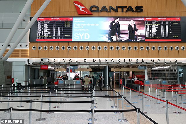 Australians have been banned from travelling overseas for a short holiday since March 20 last year and Professor Kelly said this was likely to continue. Pictured is Sydney airport