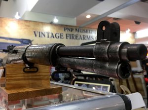 A long gun on display at the PNP Museum Vintage Firearms area of a gun show. Taken on July 2017.