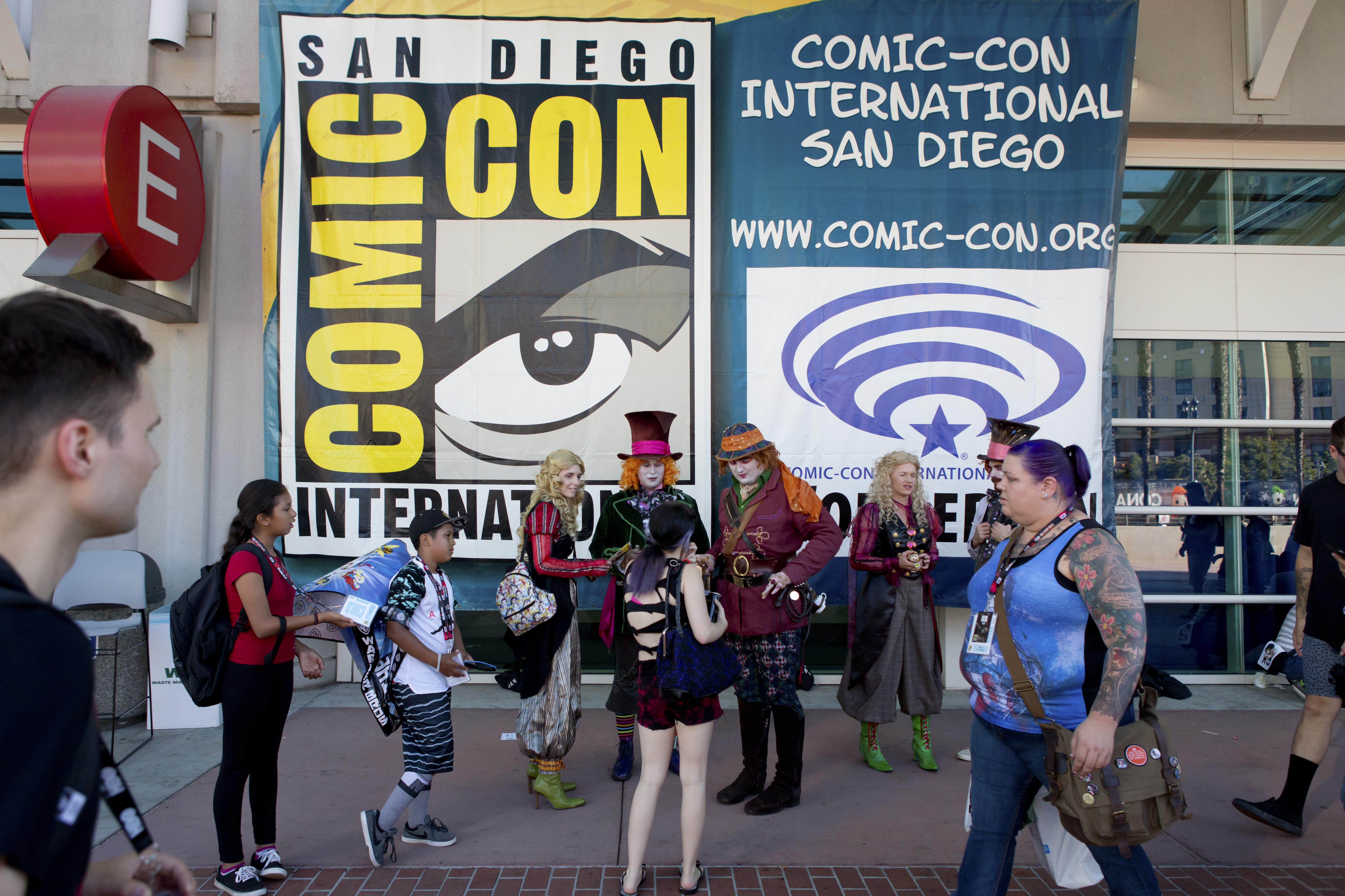 Visitors at Comic-Con poster