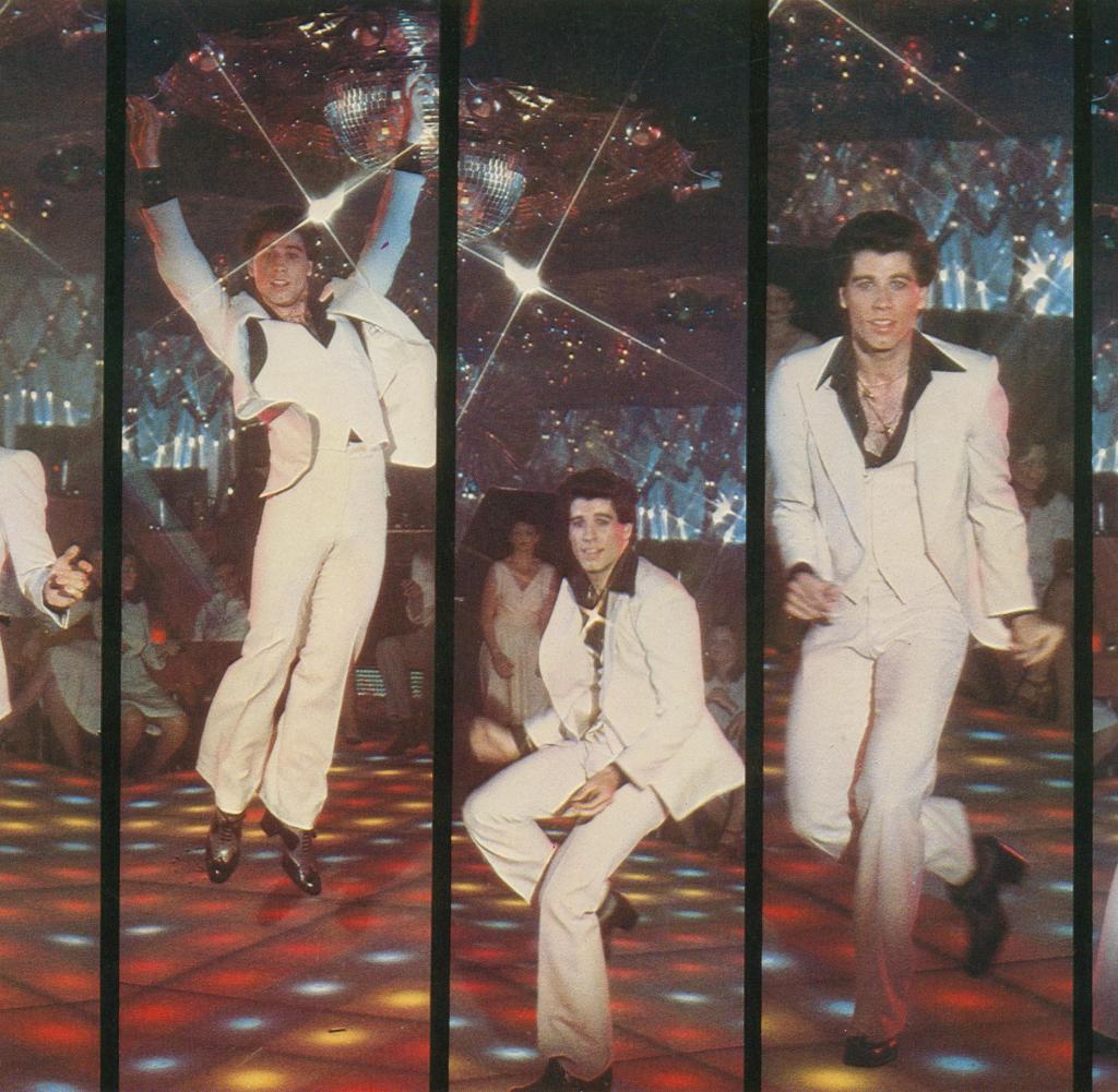 Im weißen Anzug zur Weltkarriere: Disco-König John Travolta 1977 im „2001 Odyssey Club“ in Brooklyn in dem Blockbuster „Saturday Night Fever“