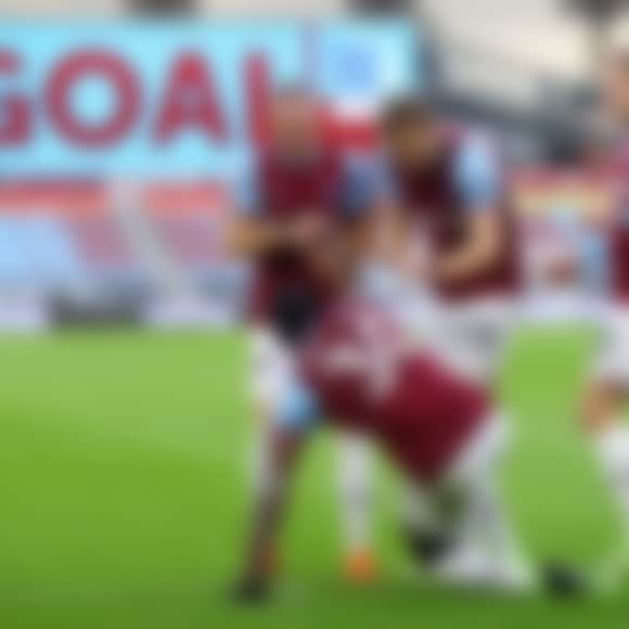 Michail Antonio of West Ham United celebrates with teammates Vladimir Coufal, Tomas Soucek, and Jarrod Bowen after scoring his team's first goal during the Premier League match between West Ham United and Burnley at London Stadium on January 16, 2021 in London, England.