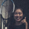 Tennis player Chan Hao-ching (also known as Angel Chan) gives the thumbs up from her hotel quarantine at the View hotel ahead of the Australian Open in Melbourne.