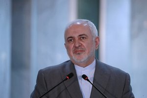 Iranian Foreign Minister, Mohammad Javad Zarif, speaks during a press conference with his Iraqi counterpart, Fouad Hussein during his visit to Baghdad, Iraq, Sunday, July 19, 2020