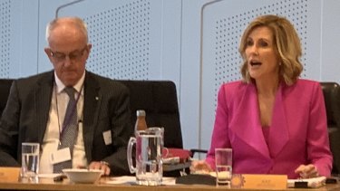 Former Police Commissioner Bob Atkinson AO APM and Kay McGrath OAM at the first Domestic and Family Violence Prevention Council meeting in February last year.