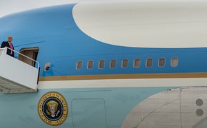 President Donald J. Trump disembarks Marine One at Valley International Airport in Harlingen, Texas Tuesday, Jan. 12, 2021, and boards Air Force One en route to Joint Base Andrews, Md.