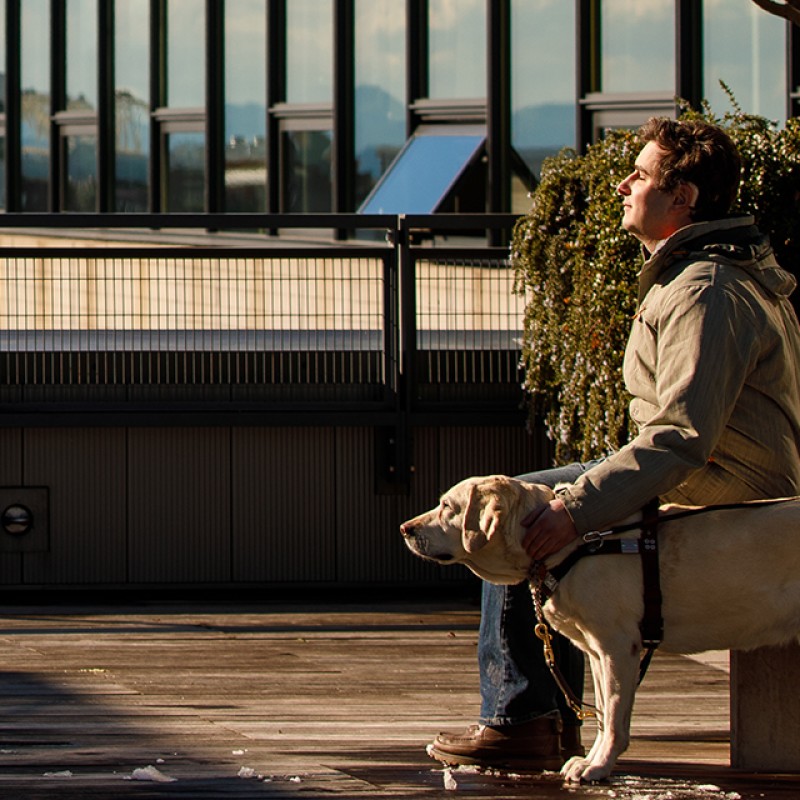 Amazon software engineer Michael Forzano and his guide dog