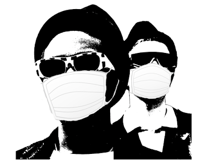 Two rude boys with pork pie hats and sunglasses are shown wearing surgical masks.