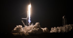 A SpaceX Falcon 9 rocket carrying the company's Crew Dragon spacecraft is launched on NASA’s SpaceX Crew-1 mission to the ISS with NASA astronauts