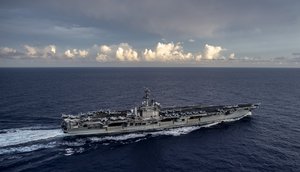 USS Nimitz (CVN 68) transits the Philippine Sea while participating in dual carrier operations with USS Theodore Roosevelt (CVN 71)