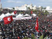 Tunisian demonstrators gather near the Prime Minister's office calling for the resignation of Prime Minister Mohamed Ghannouchi in 2011.