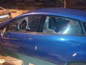 A car that was the target of stones thrown by Israeli settlers in the West Bank, January 21, 2021.