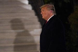 President Donald Trump arrives on the South Lawn of the White House, Tuesday, Jan. 12, 2021 in Washington.