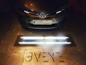 Promotional image showing the UVeye car scanning system.