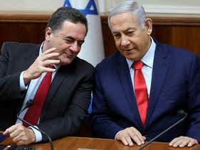 Israeli Prime Minister Benjamin Netanyahu, right, with current Finance Minister Yisrael Katz, during the weekly cabinet meeting at his Jerusalem office, Sunday, May 12, 2019.